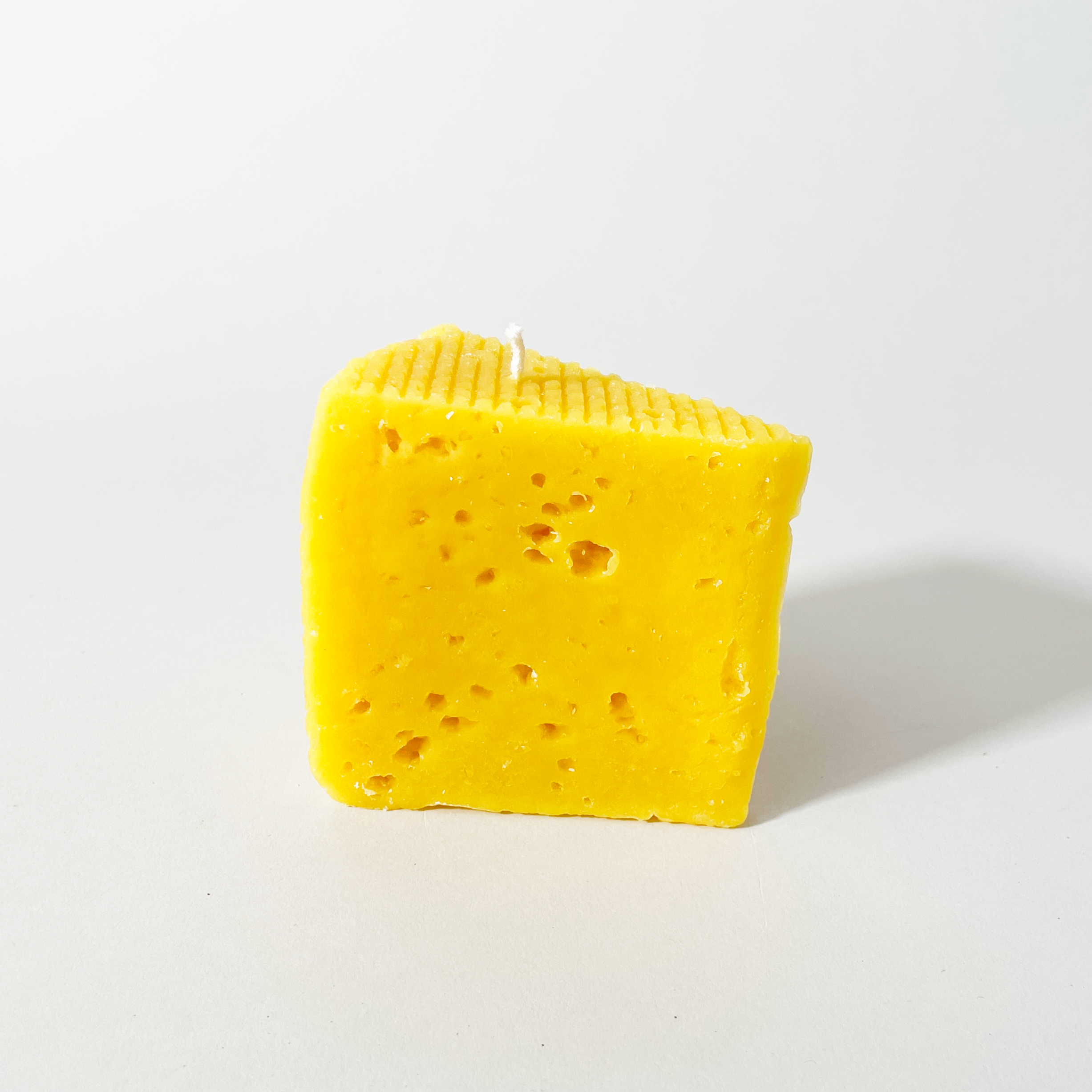 Artifaqt Blue Cheese Wedge-Shaped Pure & Aromatic Beeswax Candle Detail
